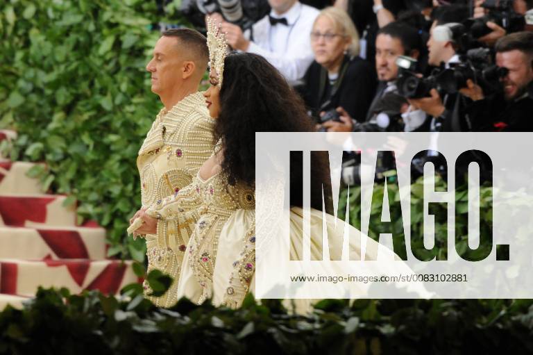 NEW YORK, NY - MAY 7: Cardi B and Jeremy Scott at the Heavenly Bodies: Fashion & The Catholic Imagination Costume Institute Gala on May 7, 2018 in New York City.