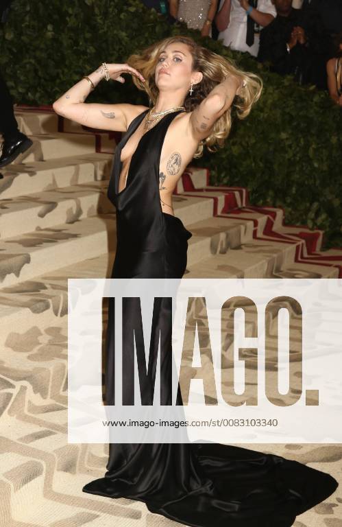New York City, New York, U.S. - Singer MILEY CYRUS attends the Costume Institute Benefit celebrating the opening of Heavenly Bodies: Fashion and the Catholic Imagination exhibit held at at The Metropolitan Museum of Art. New York City U.S. - ZUMAk03_ 20180507_zaf_k03_552