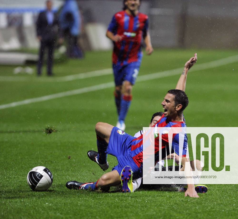 Milan Petrzela, from Viktoria Pilsen and Rosenborg BK Trondheim s Daniel Holm during their Champions League second leg third qualifying round soccer match in Pilsen, (CTKxPhoto PetrxEret) CTKPhoto104201108040028501
