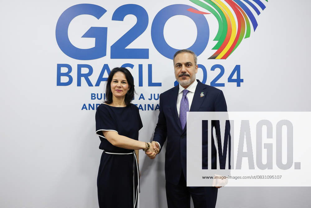 Turkish Foreign Minister Hakan Fidan in Brazil RIO DE JANEIRO, BRAZIL - FEBURARY 21: Turkish Foreign Minister Hakan Fidan (R) meets with German Foreign Minister Annalena Baerbock (L) during the G20 Foreign Ministers Meeting in Rio de Janeiro, Brazil on February 21, 2024. Rio de Janeiro Brazil. Editorial use only. Please get in touch for any other usage.