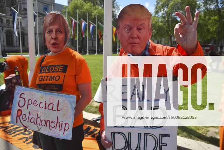 London, England, United Kingdom - Demonstrators wear the iconic orange prisoner s uniform as they demonstrate outside the Parliament asking for Guantanamo prison to be closed, London on May 9, 2018. The Guantanamo Bay detention camp is a United States military prison located within Guantanamo Bay Naval Base, also referred to as Guanto¡namo or GTMO, which is on the coast of Guanto¡namo Bay in Cuba. The camp was established by President George W. Bush s administration in 2002 during the War on Terror. London United Kingdom - ZUMAn230 20180509_zaa_n230_975
