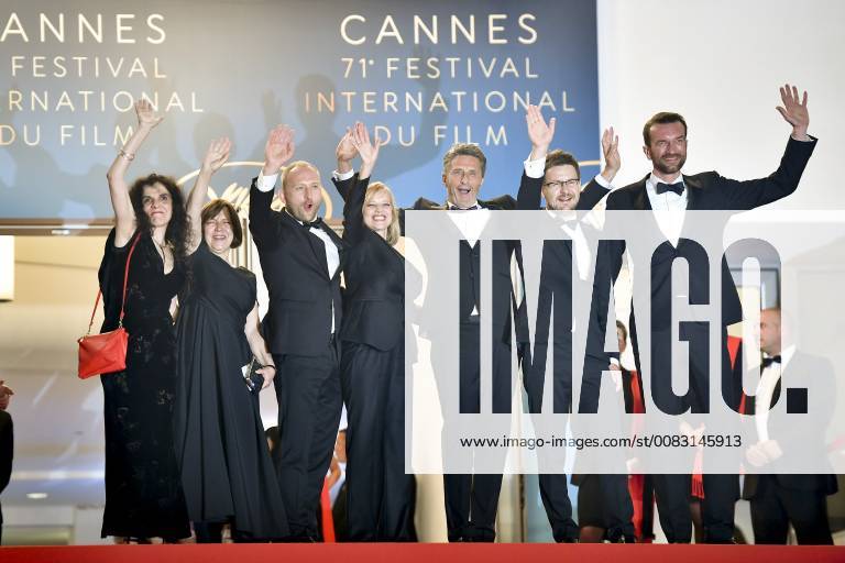 (180510) -- CANNES (FRANCE), May 10, 2018 -- Producer Tanya Seghatchian and Ewa Puszczynska, actor Borys Szyc, actress Joanna Kulig, director Pawel Pawlikowski, cinematographer Lukasz Zal, and actor Tomasz Kot (from L to R) of the film Cold War pose for photos during the premiere red carpet of Cold War at the 71st Cannes International Film Festival in Cannes, France, on May 10, 2018. The 71st Cannes International Film Festival is held from May 8 to May 19. ) FRANCE-CANNES-71ST INTERNATIONAL FILM FESTIVAL-COLD WAR-RED CARPET ChenxYichen