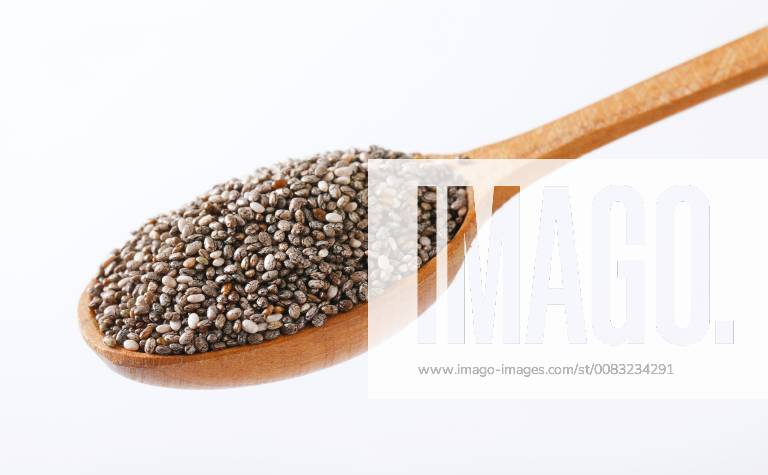 Spoon of healthy chia seeds on white background CTKPhotoF201805161192401