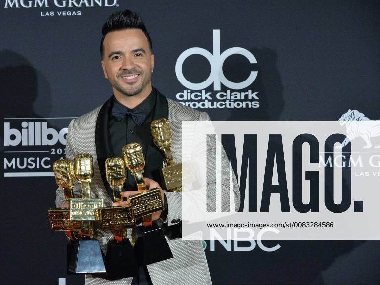 Recording artist Luis Fonsi appears backstage after winning awards for the Top Selling Song, Top Streaming Song - Video award, Top Latin Song, and Top Hot 100 Song for Despacito , during the 2018 Billboard Music Awards at MGM Grand Garden Arena on May 20, 2018 in Las Vegas, Nevada. LAV20180520345 JIMxRUYMEN