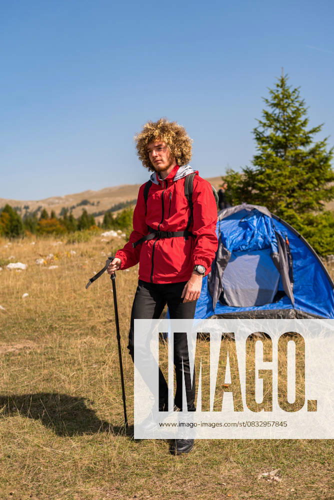 A male hiker solo camping and hiking in the mountain forest adventure travel. A male hiker solo camping and hiking in the mountain forest adventure travel. High quality photo, model released, , 95976000.jpg RECORD DATE NOT STATED