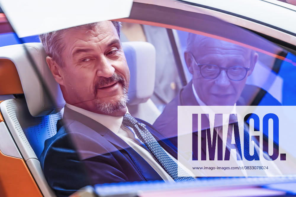 Federal Chancellor Merz and Minister President Söder in a concept car at the Qualcomm stand, tour of the exhibition at the opening of the IAA Mobility 2025, Messe Münch
