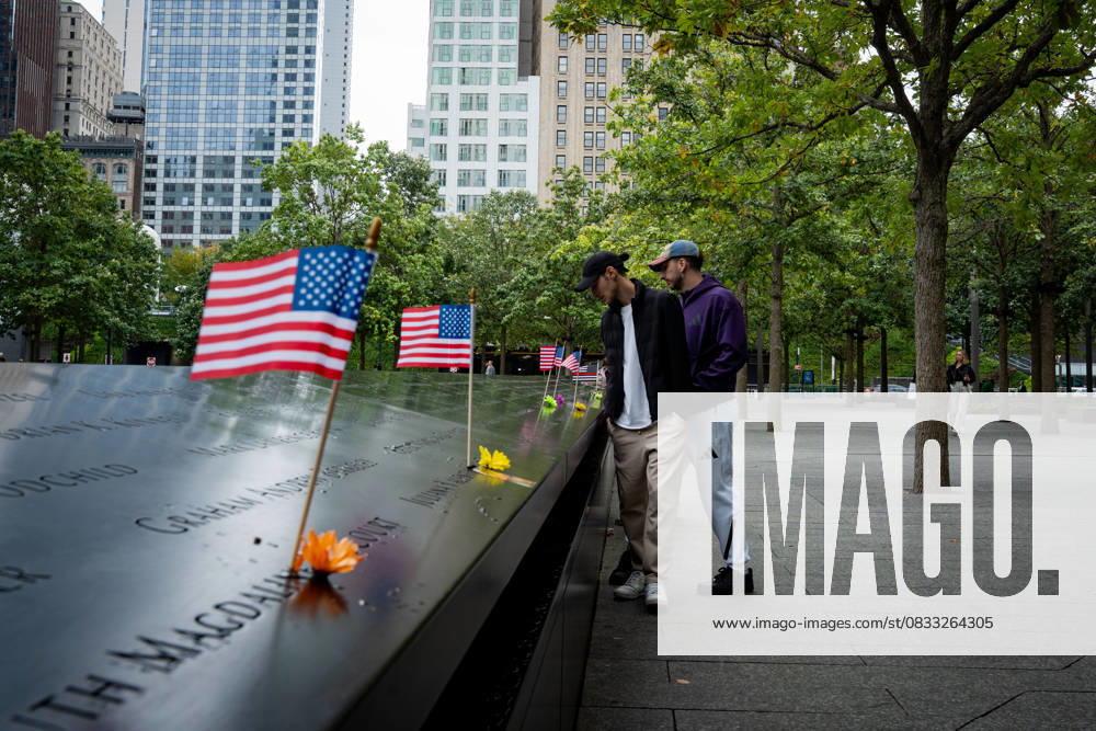 Visitors look at the names of victims inscribed on the 9 11 memorial in Lower Manhattan on the day before the anniversary date. This year marks 24 years since the Twin Towers were attacked in the deadliest terror attack in history. New York USA - ZUMAg280 20250910_znp_g280_002