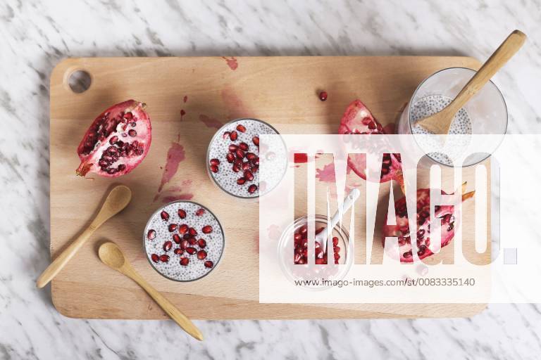 Two glasses of chia pudding with pomegranate seed RTBF01147