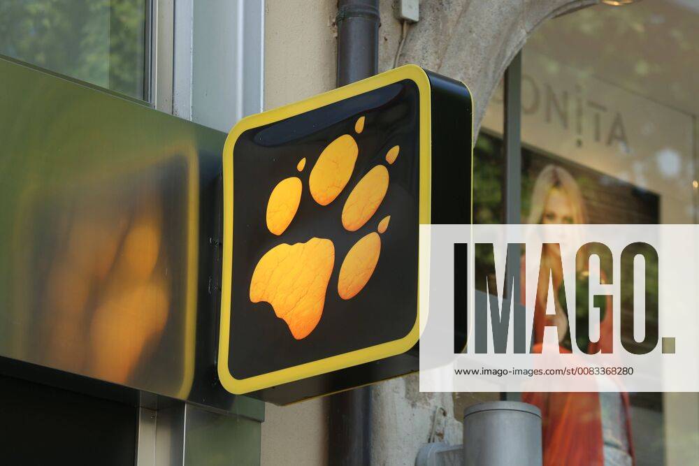 Munich, Bavaria, Germany - The logo of Jack Wolfskin is seen in the Munich pedestrian zone. Munich Germany - ZUMAn230 20180522_zaa_n230_1191