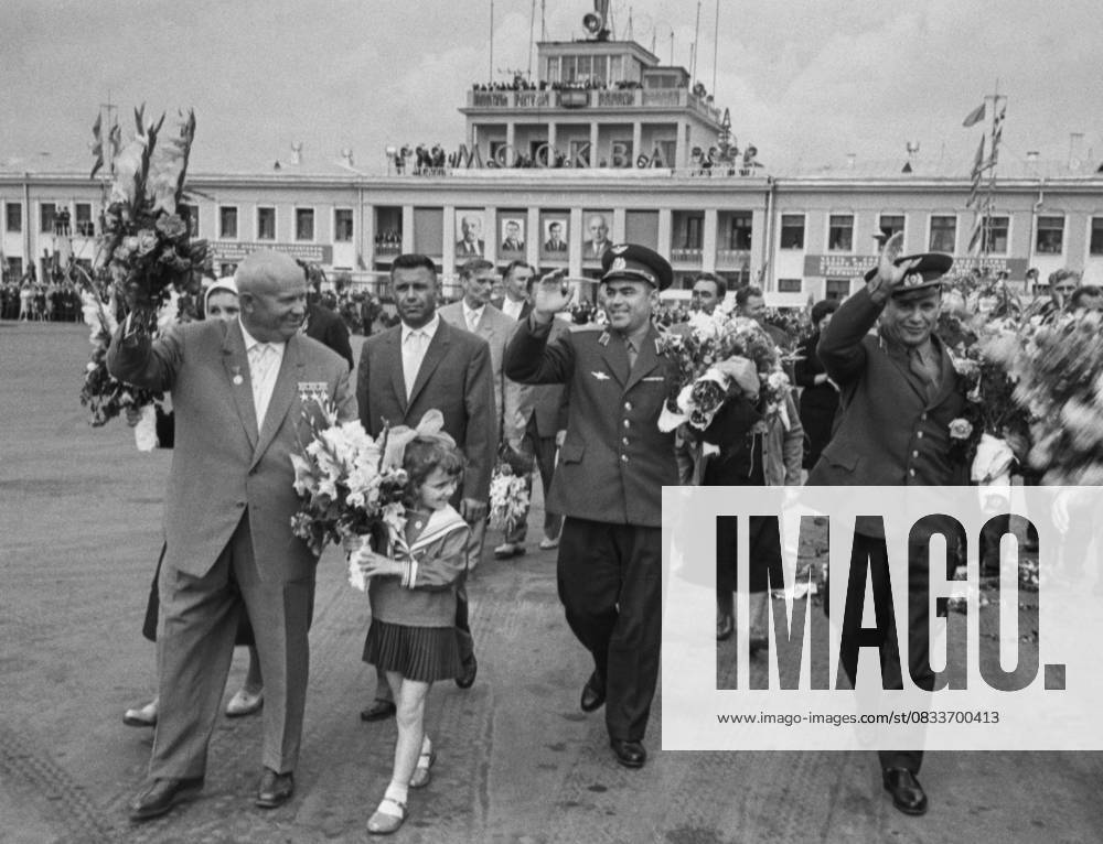 Moscow, USSR. Soviet cosmonauts Pavel Popovich and Andriyan Nikolayev, who performed the first joint multi-day spaceflight in the history of cosmonautics on Vostok 4 and Vostok 3 spacecraft, and First Secretary of the Central Committee of the Communist Party of the Soviet Union, Chairman of the Council of Ministers of the USSR Nikita Khrushchev (R-L front) take part in the welcoming ceremony at Vnukovo Airport. Vladimir Savostyanov TASS 32416521