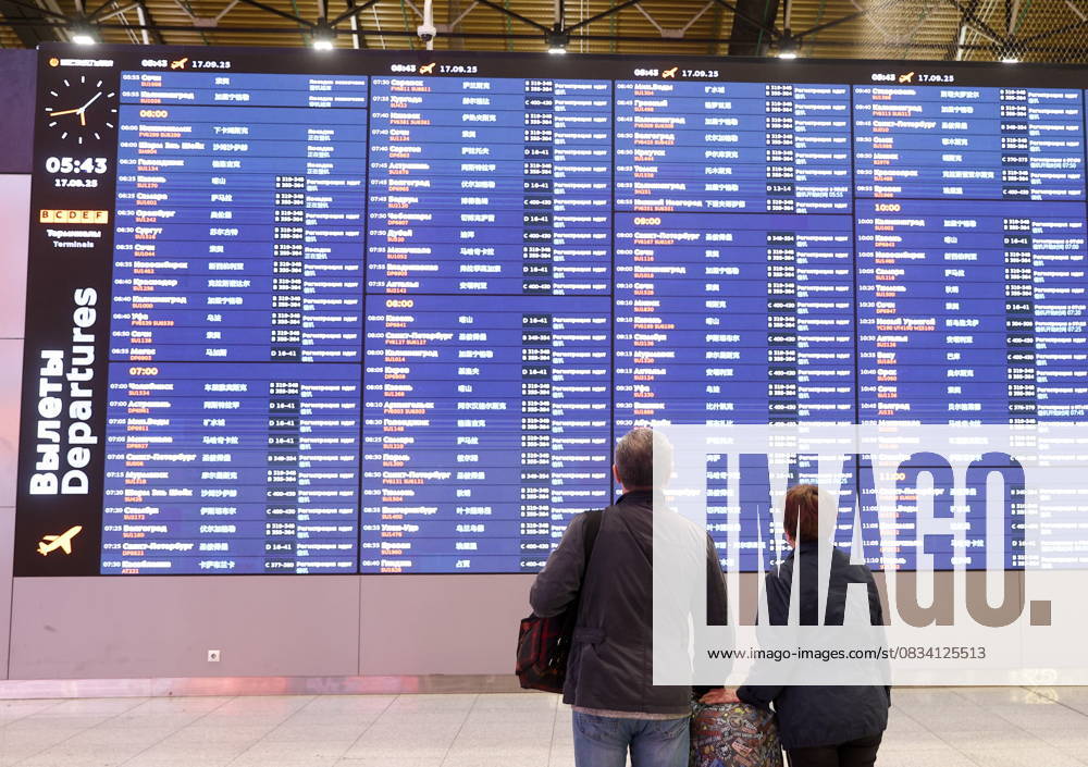 RUSSIA, MOSCOW REGION - SEPTEMBER 17, 2025: Travelers read a flight information display board as an Aeroflot flight prepares to depart from Sheremetyevo International Airport to Krasnodar. On 11 September 2025, Krasnodar International Airport resumed operations, with the first civil flight since 2022 expected to land there on September 17. Sofya Sandurskaya TASS 84063506