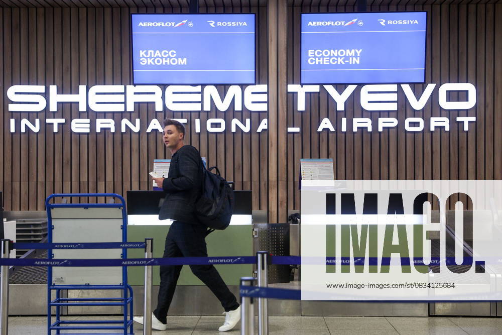 RUSSIA, MOSCOW REGION - SEPTEMBER 17, 2025: A man checks in for an Aeroflot flight to Krasnodar at Sheremetyevo International Airport. On 11 September 2025, Krasnodar International Airport resumed operations, with the first civil flight since 2022 expected to land there on September 17. Sofya Sandurskaya TASS 84063762