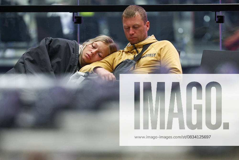RUSSIA, MOSCOW REGION - SEPTEMBER 17, 2025: A woman sleeps on a man s shoulder at Sheremetyevo International Airport. Sofya Sandurskaya TASS 84064008
