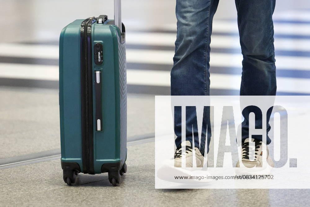 RUSSIA, MOSCOW REGION - SEPTEMBER 17, 2025: A man wheels along his suitcase at Sheremetyevo International Airport. Sofya Sandurskaya TASS 84063938