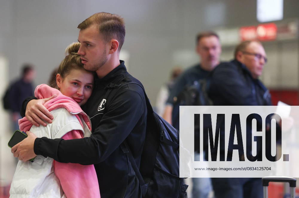 RUSSIA, MOSCOW REGION - SEPTEMBER 17, 2025: Young people share a hug at Sheremetyevo International Airport. Sofya Sandurskaya TASS 84063949