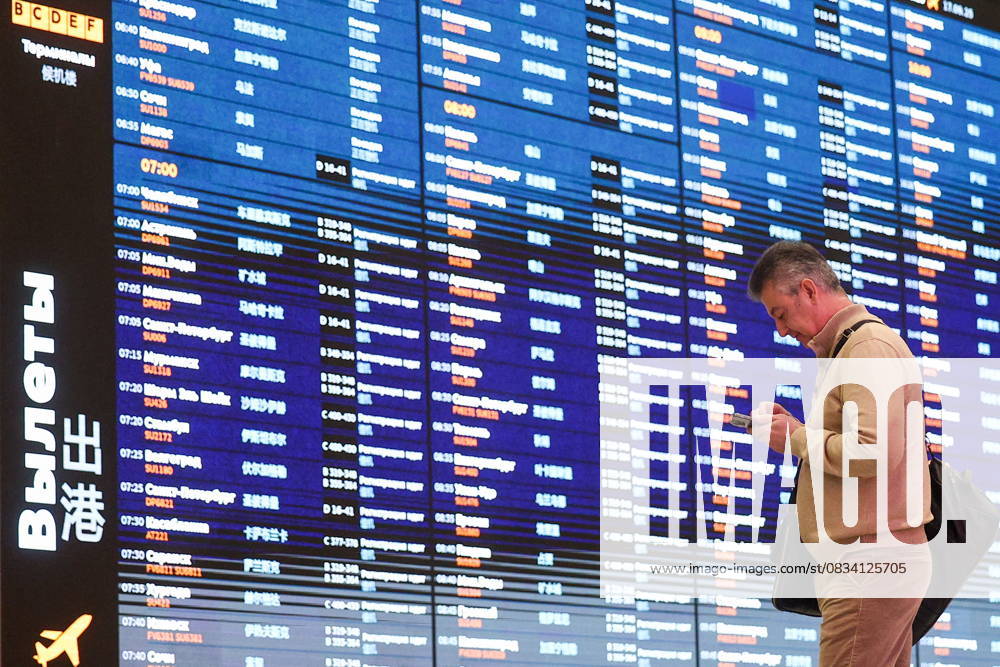 RUSSIA, MOSCOW REGION - SEPTEMBER 17, 2025: A man stands before a flight information display board at Sheremetyevo International Airport. Sofya Sandurskaya TASS 84063955