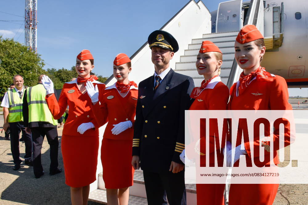 RUSSIA, KRASNODAR - SEPTEMBER 17, 2025: Members of the crew pose together outside their plane as an Aeroflot flight from Moscow arrives at Krasnodar International Airport. Operations resumed on 11 September 2025, it is the first civil flight to land here since 2022. Roman Sokolov TASS 84066810