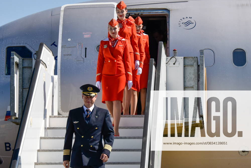 RUSSIA, KRASNODAR - SEPTEMBER 17, 2025: Members of the crew step off their plane as an Aeroflot flight from Moscow arrives at Krasnodar International Airport. Operations resumed on 11 September 2025, it is the first civil flight to land here since 2022 Krasnodar Russia - ZUMAt113 20250917_zaa_t113_096
