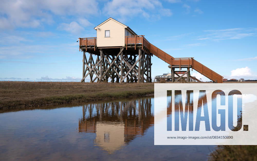 Sankt Peter Ording, North Frisia, Germany SANKT PETER ORDING, GERMANY - MARCH 8, 2023: Panoramic image of beach houses of Sankt Peter Ording close to the North Sea on March 8, 2023 in North Frisia, Germany, 95869404