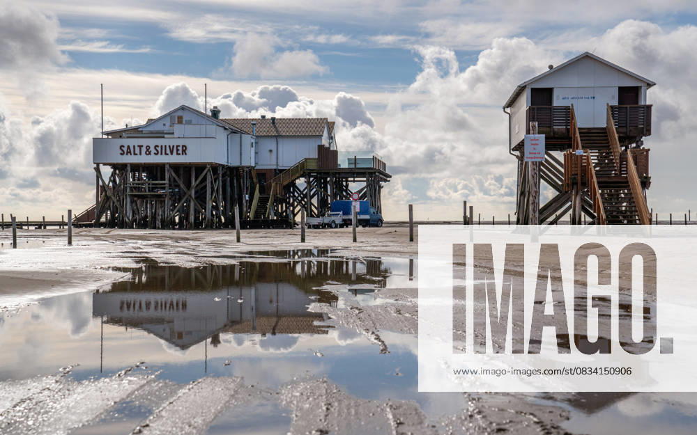 Sankt Peter Ording, North Frisia, Germany SANKT PETER ORDING, GERMANY - MARCH 8, 2023: Panoramic image of beach houses of Sankt Peter Ording close to the North Sea on March 8, 2023 in North Frisia, Germany, 95869406