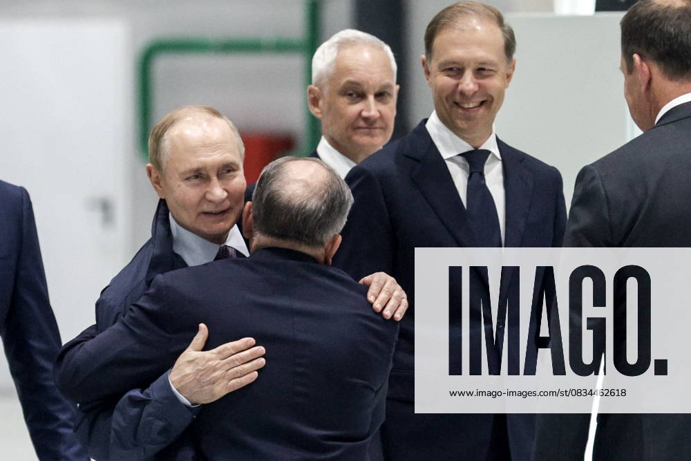RUSSIA, MOSCOW - SEPTEMBER 19, 2025: Vladimir Putin, President of Russia, accompanied by First Deputy Prime Minister Denis Manturov (L-R middle) and Defence Minister Andrei Belousov, visits the machine assembly shop of Motovilikha Plants, a local defence enterprise. Mikhail Sinitsyn TASS 84137970