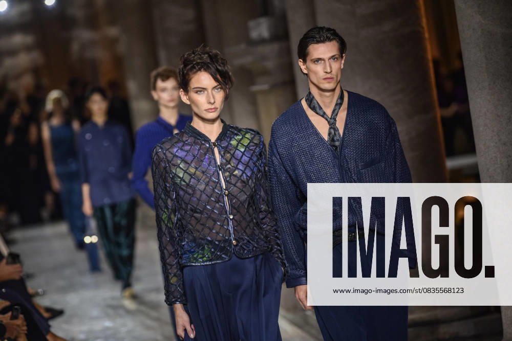A model wearing an outfit with a portrait of Giorgio Armani is pictured before the Giorgio Armani collection show at Milan s Fashion Week Womenswear Spring Summer 2026, at the Pinacoteca di Brera Museum on September 28, 2025 in Milan. ANSA MATTEO CORNER Milan Italy - ZUMAa110 20250928_zaf_a110_064
