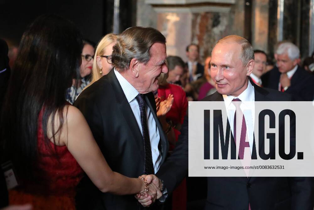 Former Chancellor of the Federal Republic of Germany, Chairman of the Shareholdersâ€ Committee at Nord Stream AG, Gerhard Schroder (C front), and Russia s President Vladimir Putin (R) at an exhibition of paintings by old masters from the collections of St Petersburg s State Hermitage Museum at Vienna s Kunsthistorisches Museum. Mikhail Klimentyev Russian Presidential Press and Information Office TASS TS082BE9
