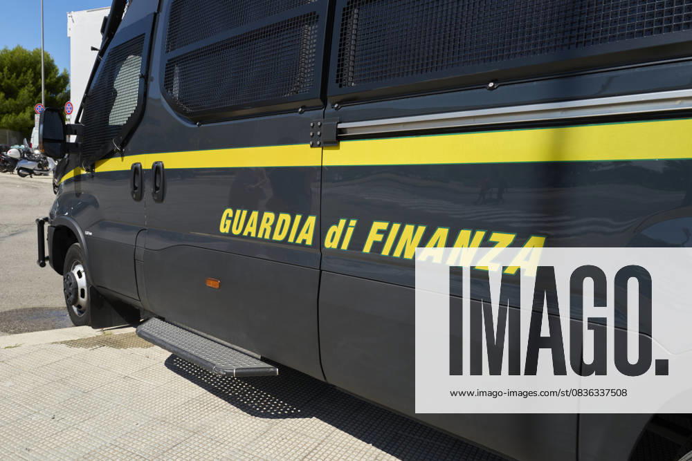 Italian Police Officers On Duty In Urban Area A close-up of an Italian Guardia di Finanza riot control van highlights law enforcement vehicles and public security operations in Bari, Italy, on September 22, 2025. Bari Italy