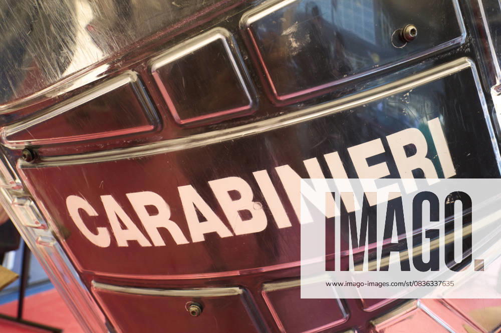 Italian Police Officers On Duty In Urban Area A close-up of an Italian Carabinieri riot shield shows a detailed view of a transparent riot shield used by Italian Carabinieri during public demonstrations, highlighting law enforcement equipment and safety measures in Bari, Italy, on September 22, 2025. Bari Italy