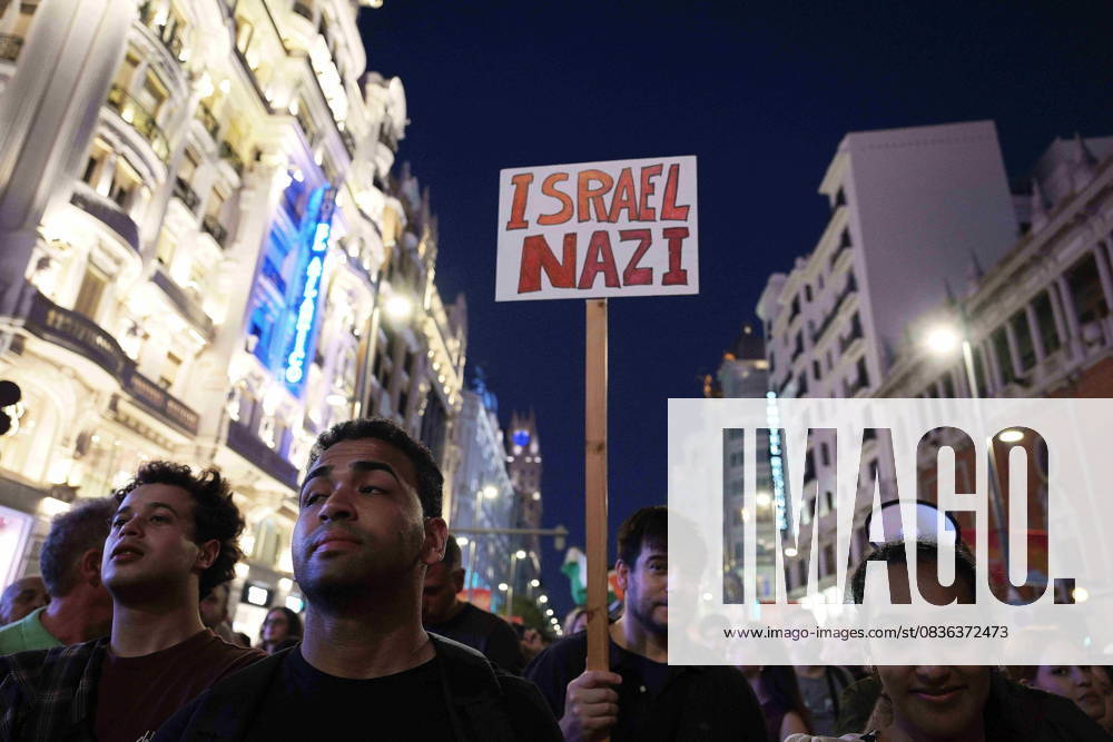 Protesters hold banners and Palestinian banners during a demonstration in solidarity with the Palestinians in the Gaza strip, in Madrid. Madrid Spain - ZUMA- Oc 20251004_zsp_d308_010