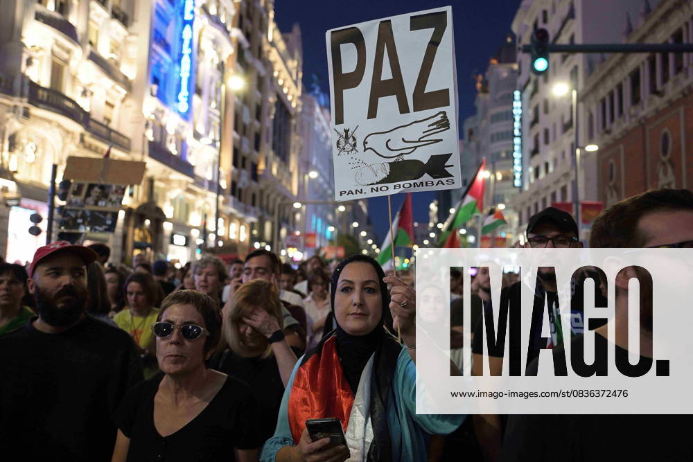 Protesters hold banners and Palestinian banners during a demonstration in solidarity with the Palestinians in the Gaza strip, in Madrid. Madrid Spain - ZUMA- Oc 20251004_zsp_d308_012