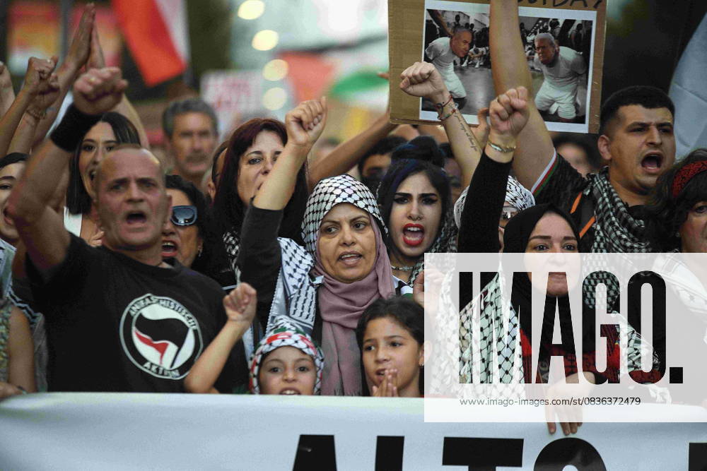 Protesters hold banners and Palestinian banners during a demonstration in solidarity with the Palestinians in the Gaza strip, in Madrid. Madrid Spain - ZUMA- Oc 20251004_zsp_d308_014