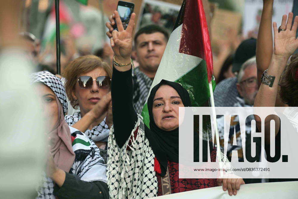 Protesters hold banners and Palestinian banners during a demonstration in solidarity with the Palestinians in the Gaza strip, in Madrid. Madrid Spain - ZUMA- Oc 20251004_zsp_d308_017