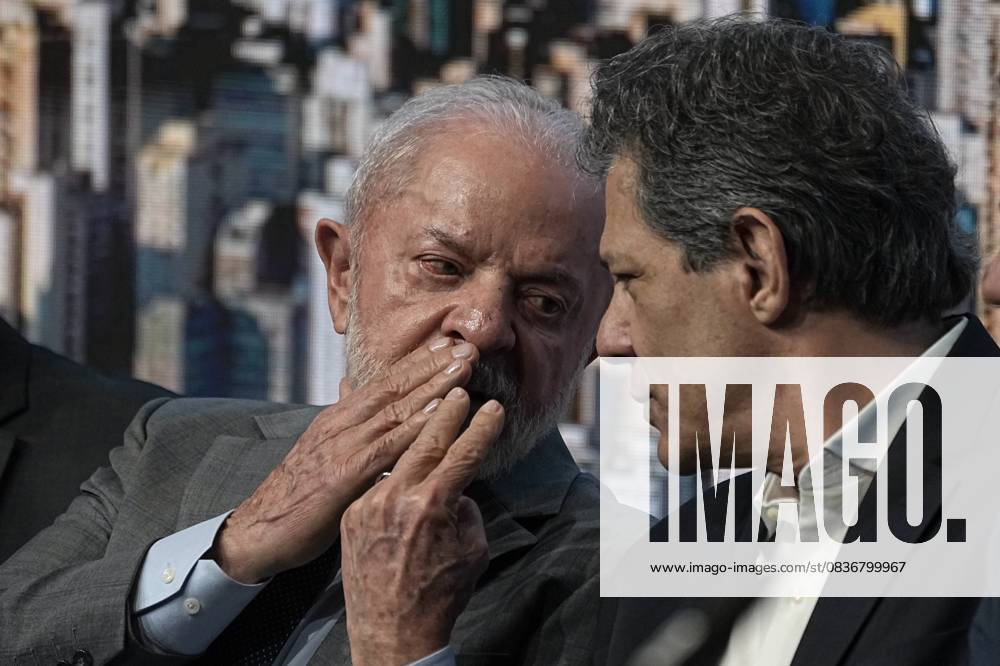 Brazilian President LUIZ INACIO LULA DA SILVA (left) and finance minister FERNANDO HADDAD participate in the signing ceremony of the new real estate credit model in Sao Paulo, Brazil, on Oct 10, 2025. Sao Paulo Brazil - ZUMAl146 20251010_aaf_l146_004