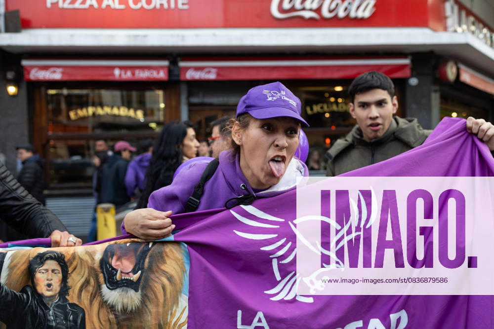 A Javier Milei supporter mocks anti-government protesters during the Argentine presidentâ€⠢s new book launch at Movistar Arena. Buenos Aires Argentina - ZUMAp265 20251006_zip_p265_001