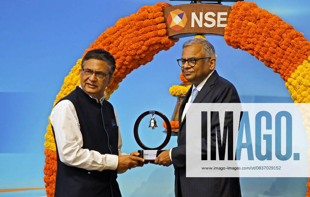 L-R Ashish Kumar Chauhan, Managing Director (MD) and Chief Executive Officer (CEO) of National Stock Exchange (NSE) gives a memento to Natarajan Chandrasekaran, Chairman of Tata Sons during the Initial Public Offer (IPO) listing ceremony at the National Stock Exchange (NSE) in Mumbai. Mumbai India - ZUMAs197 20251013_aaa_s197_004