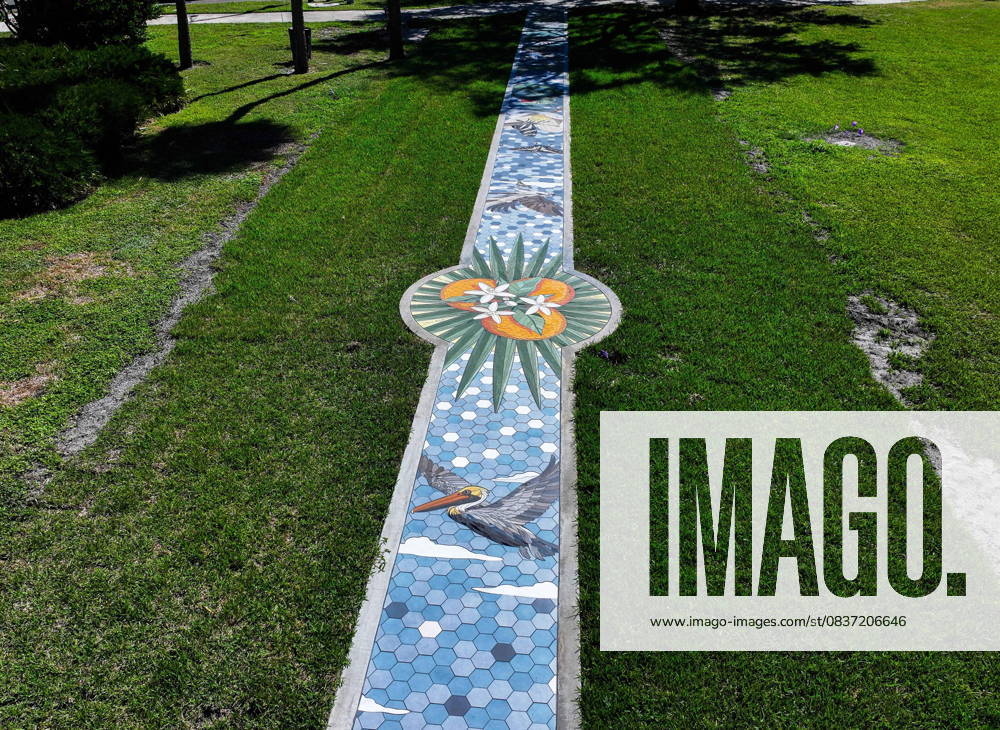 An aerial drone view of The Sunshine City Mosaic sidewalk mural at Sunset Park, 7340 Central Ave, on Monday, Oct. 13, 2025 in St. Petersburg. The 175 foot long side walk mural is the largest in the Southeast. St. Petersburg USA - ZUMAidew 20251013_zan_s70_050