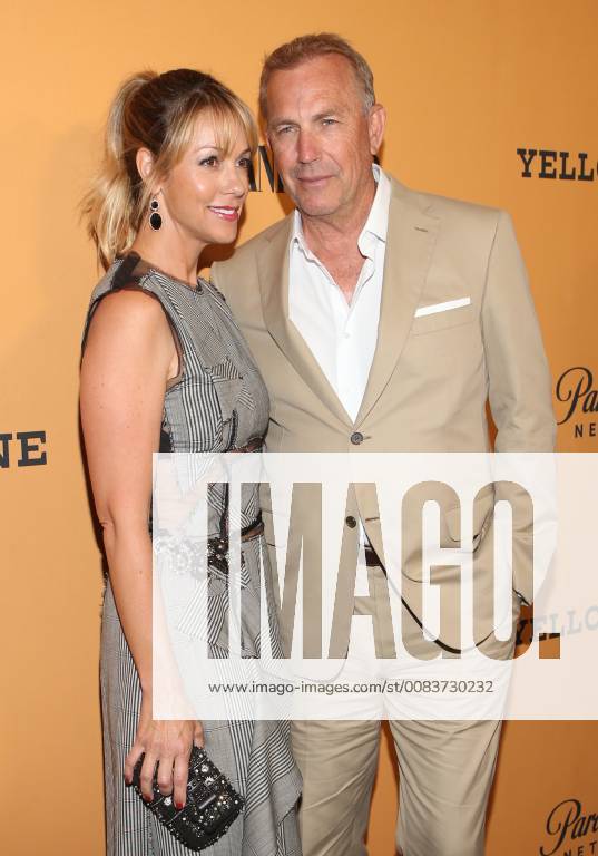 LOS ANGELES, CA - JUNE 11:Christine Baumgartner and Kevin Costner at the premiere of Yellowstone at Paramount Studios in Los Angeles, California on June 11, 2018.