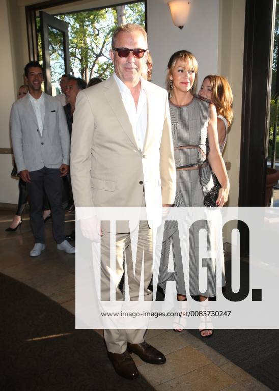 LOS ANGELES, CA - JUNE 11:Christine Baumgartner and Kevin Costner at the premiere of Yellowstone at Paramount Studios in Los Angeles, California on June 11, 2018.