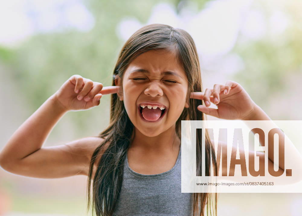 Upset, young girl and hands on ears with shouting and screaming for autism and mental health. Frustrated, female kid and burnout with stress, anxiety and fatigue from loud noise for ADHD with face Upset, young girl and hands on ears with shouting and screaming for autism and mental health. Frustrated, female kid and burnout with stress, anxiety and fatigue from loud noise for ADHD with face., model released, , 60467818.jpg RECORD DATE NOT STATED
