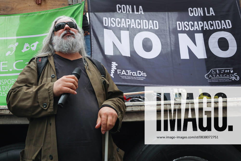 A blind man waits to give a speech near the National Ministry of Health during the demonstration calling for enforcement of the Disability Emergency Law. Buenos Aires Argentina - ZUMAp265 20251022_zip_p265_009