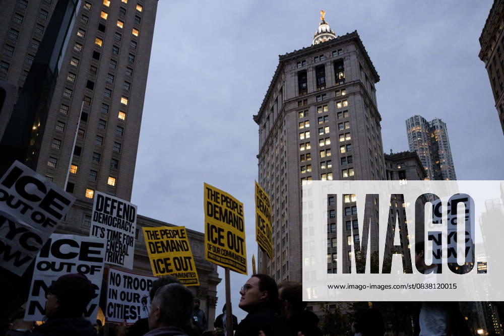 Protesters hold signs demanding ICE, and troops, out of New York City, during a demonstration at Foley Square, in New York, on Wednesday, Oct. 22, 2025. This response comes after more than 50 federal agents arrested immigrant vendors at Canal Street, lower Manhattan, on Tuesday. New York USA - ZUMAs368 20251022_zip_s368_013