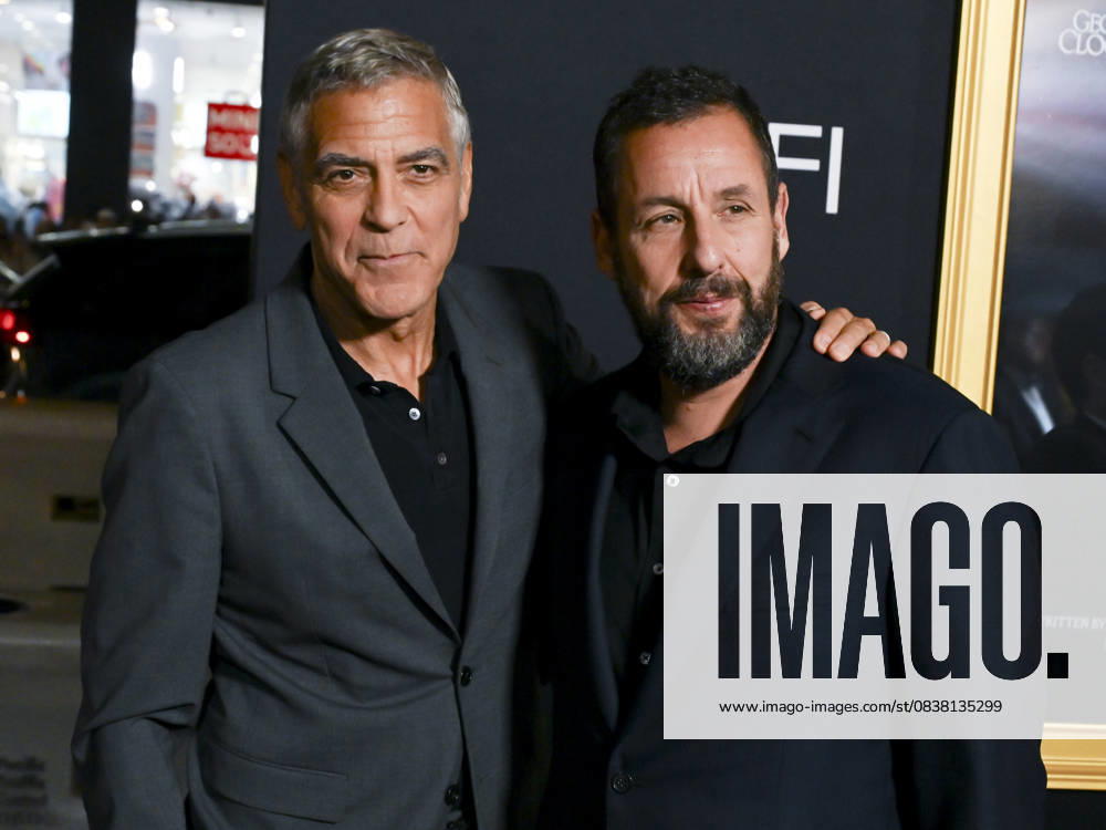 American actor, filmmaker, activist, and humanitarian GEORGE CLOONEY and American actor and comedian ADAM SANDLER attend AFI FEST Presented By Red Carpet Premiere of Jay Kelly Hollywood USA - ZUMAb173 20251023_aap_b173_001