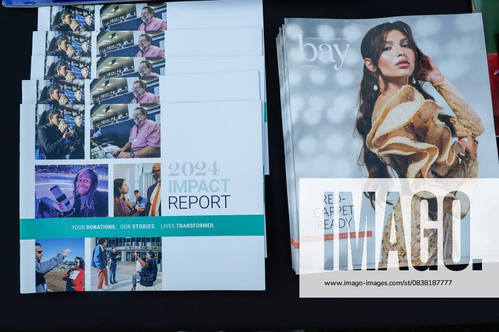The Tampa Bay Times impact report and Bay magazine are displayed on a table during the annual Cocktails and News fundraiser event on Thursday, Oct. 23, 2025, in St. Petersburg. St. Petersburg USA - ZUMAs70_ 20251023_zan_s70_070