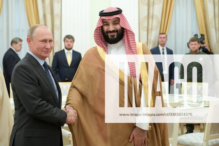 MOSCOW, RUSSIA â€“ JUNE 14, 2018: Russia s President Vladimir Putin (L) shakes hands with Saudi Arabia s Crown Prince Mohammed Bin Salman Al Saud during talks at the Moscow Kremlin. Alexei Druzhinin Russian Presidential Press and Information Office TASS TS0841CE