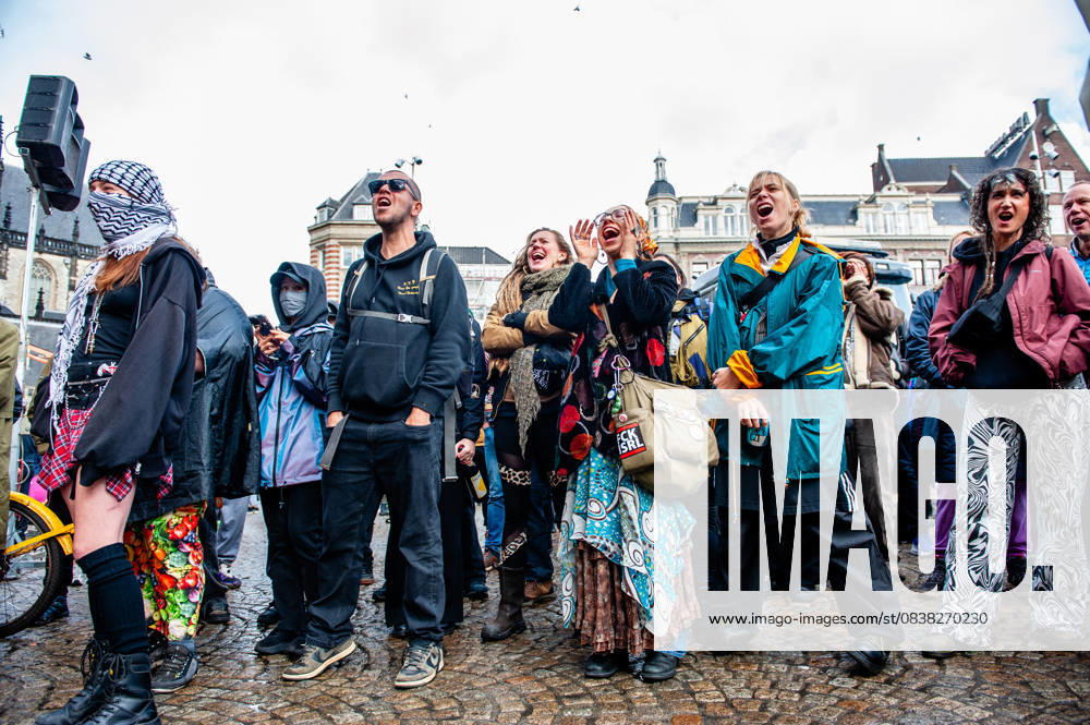 People are screaming after one of the speeches. ADEV (Amsterdam Danst Ergens Voor), in English Amsterdam Dances For A Cause , organized for the 13th time its annual demonstration for squatting, free spaces, and affordable housing in the city. People danced, accompanied by large trucks and loud music systems, to reclaim more free spaces in the city. Amsterdam Netherlands - ZUMAs197 20251025_aaa_s197_438