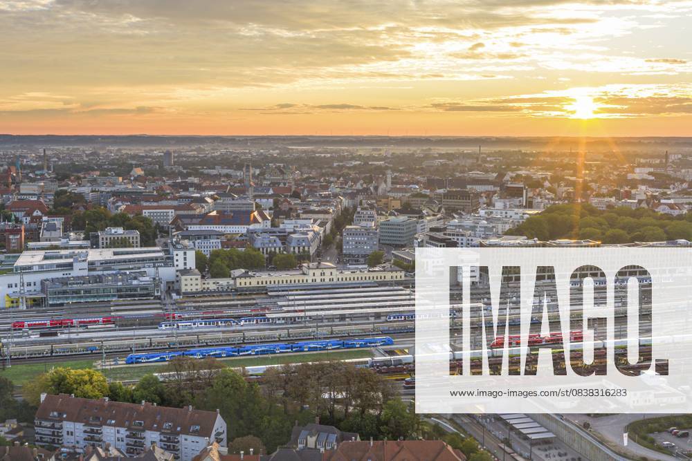 Magnificent sunrise in late summer over Augsburg in Bavarian Swabia View of Augsburg in the morning around the Wertach Auen Augsburg Thelottviertel Bavaria Germany