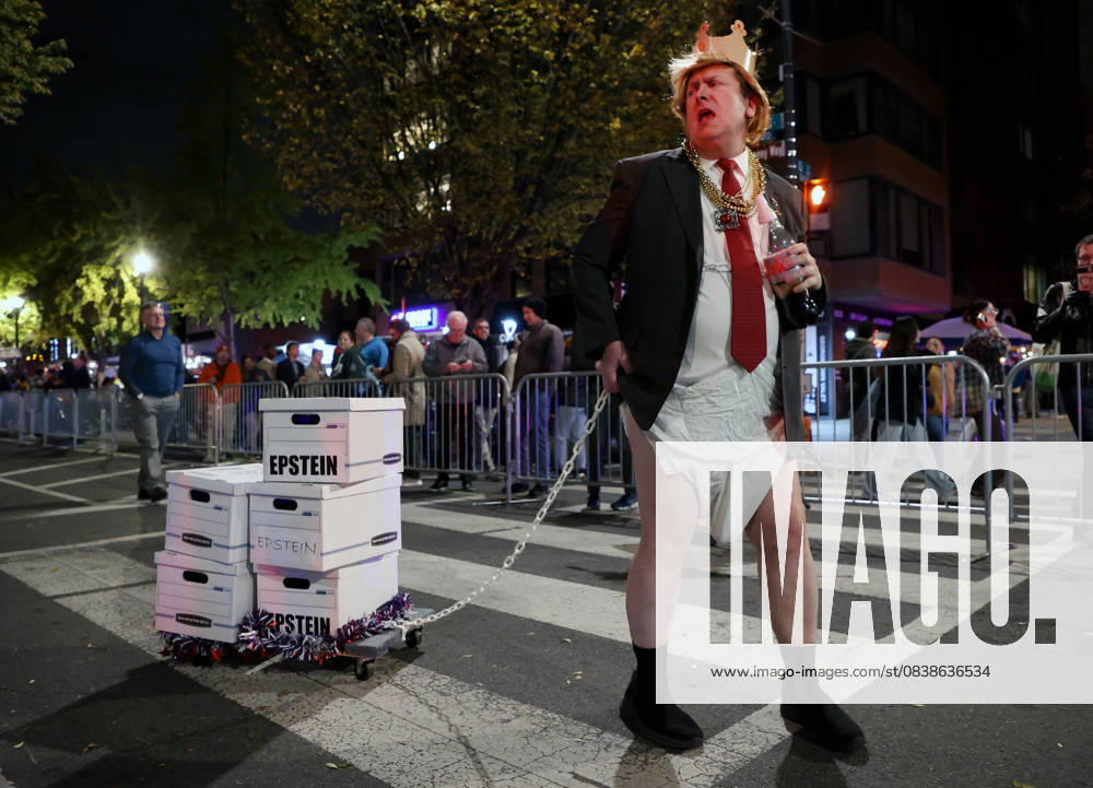 Washington District of Columbia, USA: A participant mimicking the US President Donald Trump.take part in the 38th Annual 17th Street High Heel Race in the Dupont Circle neighborhood of Washington, D.C.. Since 1986, costumed drag queens and others in the LGBTQ community have participated in the race held on the Tuesday before Halloween. Washington USA - ZUMAs337 20251028_znp_s337_005