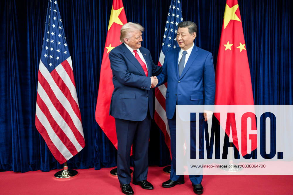 President Donald Trump greets Chinese President Xi Jinping before a bilateral meeting at the Gimhae International Airport terminal, on Thursday, October 30, 2025, in Busan, South Korea. WAX2025103007 DANIELxTOROK