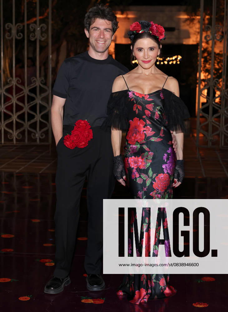 Max Greenfield and Tess Sanchez attend the 2025 Dia De Muertos Gala Presented by Lexus, Tequila Don Julio, Nike, DNERO, Calamigos Ranch and Maremoto at the Los?Angeles? River?Center?&?Gardens in Los Angeles on Thursday, October 30, 2025. LAP20251030094 GREGxGRUDT